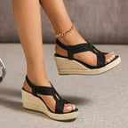 Sandali con zeppa intrecciata