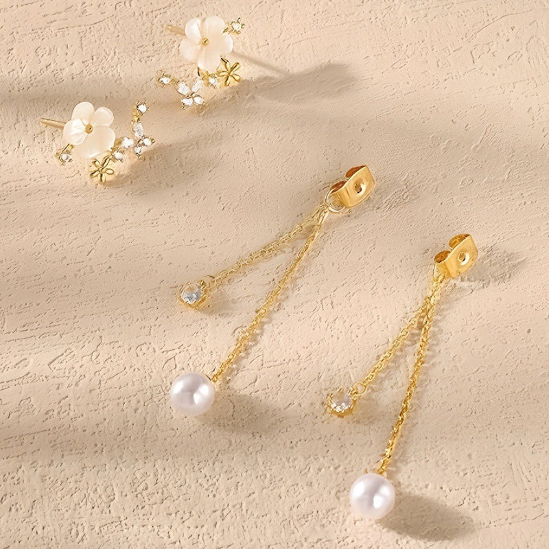 Orecchini a fiore con perla e nappa